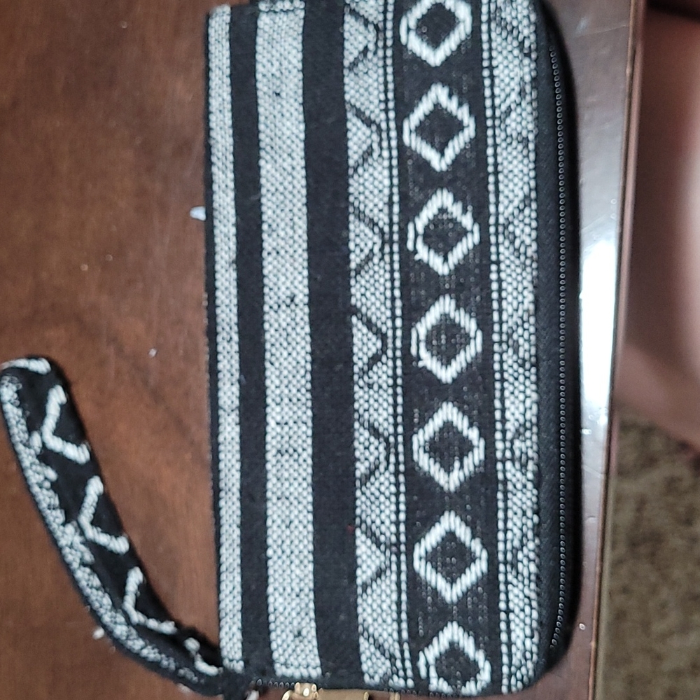 Clutch bag new, black and white with cheetah print interior pockets